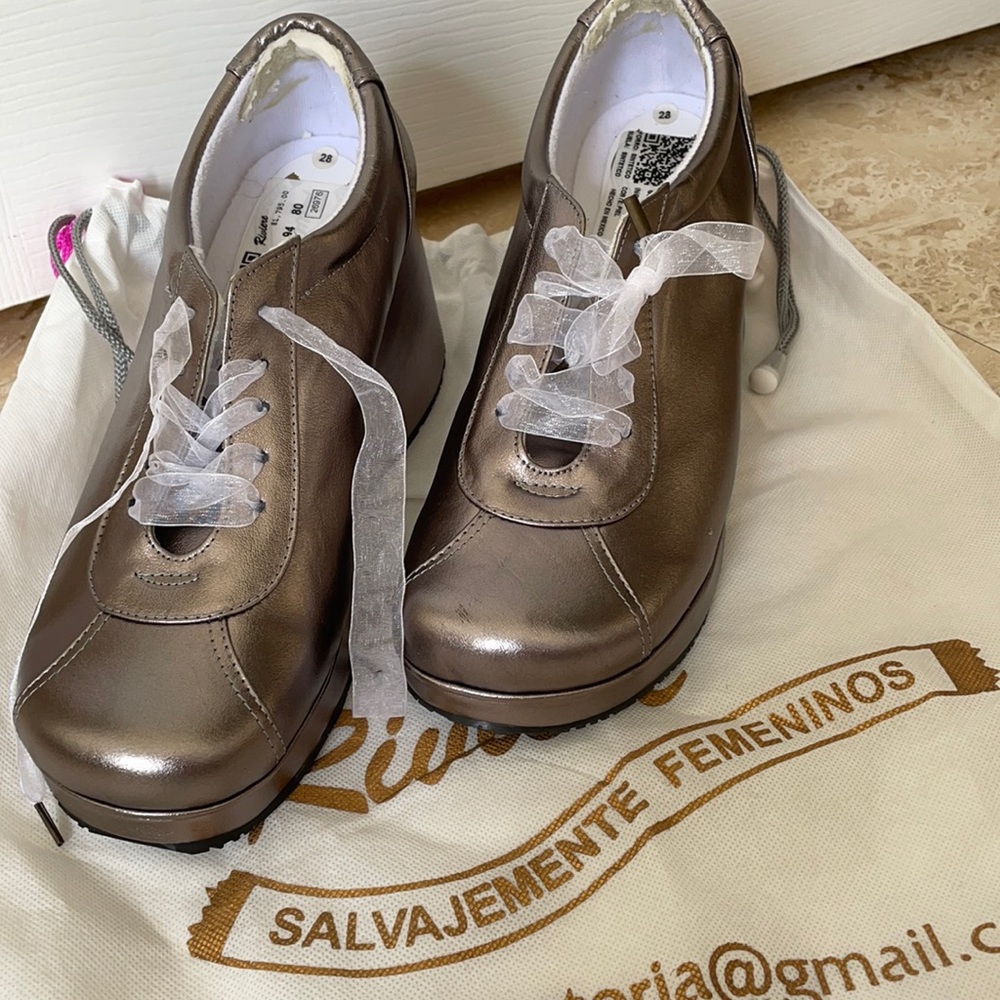 BRAND NEW Silver Sneakers/Ribbon laces. Size 10